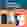 The "Business Insider" logo in white on blue, above an Issuu magazine reader shown on a desktop, a mobile phone, and a tablet.